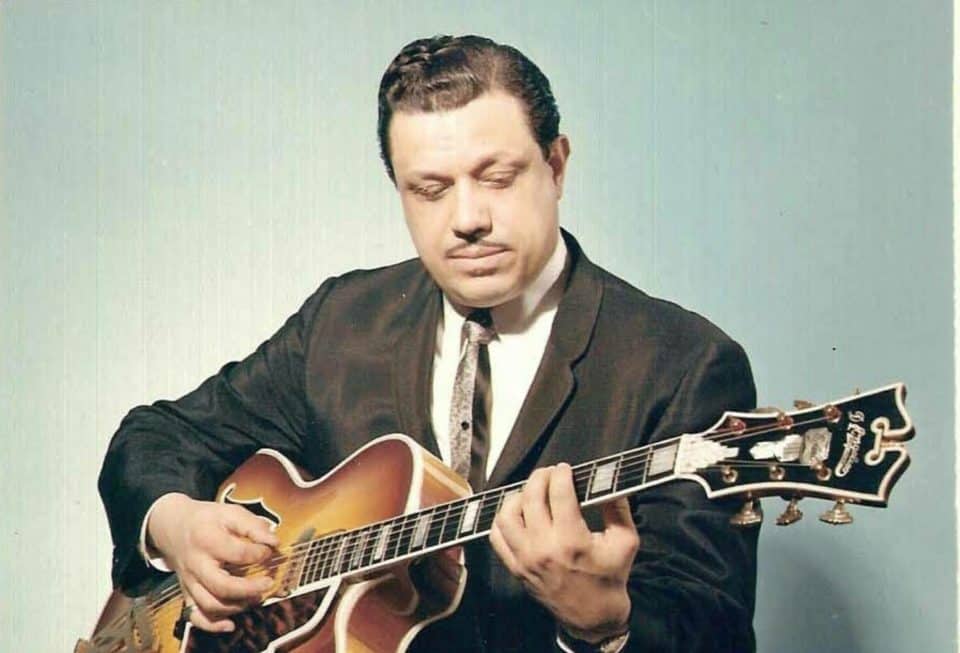 Lou Sosa playing a d'angelico guitar