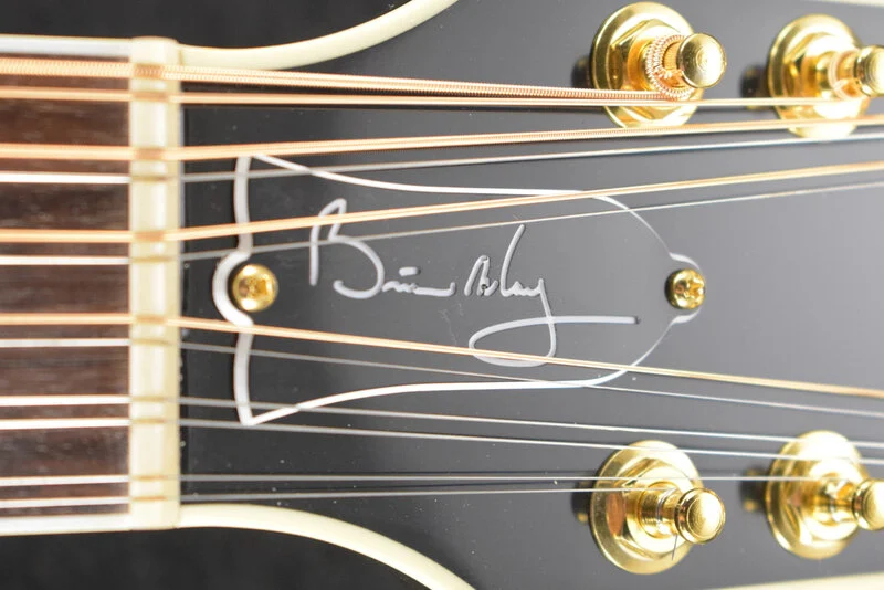 the nut and signature feature of the the Gibson Brian May SJ-200 12-String Vintage Sunburst