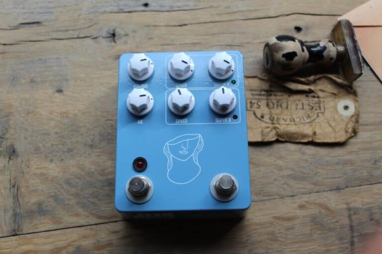 jhs artificial blonde pedal on a wood surface