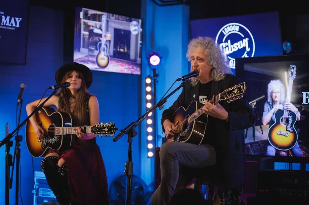 brian may performing on stage with his the Gibson Brian May SJ-200 12-String Vintage Sunburst